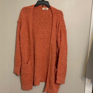 Coral popcorn sweater